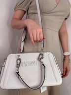 BOLSO DE MANO STEVE MADDEN BLANCO